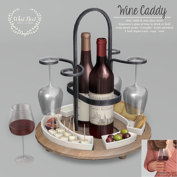 a wine caddy with two bottles of wine and some appetizers on it