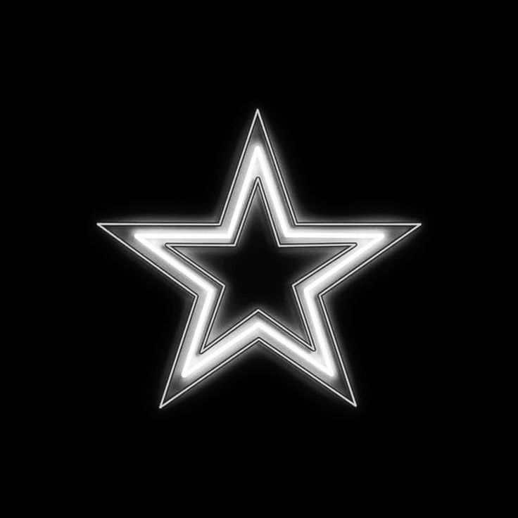 a white star on a black background with the light reflecting off it's side