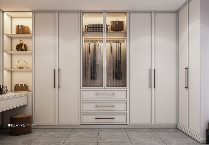 a white closet filled with lots of drawers