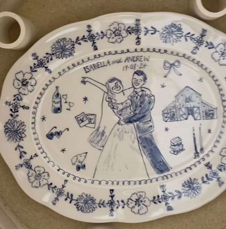 a blue and white plate with an image of a man and woman holding each other