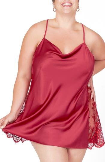 Silky charmeuse beautifully glides down your figure on this drape-neck chemise simply detailed with sheer lace sides. 100% polyester Machine wash, dry flat Imported Coquette Satin Chemise With Spaghetti Straps, Satin Chemise With Lace Trim For Party, Party Satin Chemise With Lace Trim, Satin Chemise With Built-in Bra, Sleeveless Satin Chemise With Lace Trim, Sleeveless Satin Chemise For Night Out, Satin Camisole Chemise With Built-in Bra, Sheer Sleeveless Satin Slip Dress, Satin Camisole Slip Dress In Coquette Style