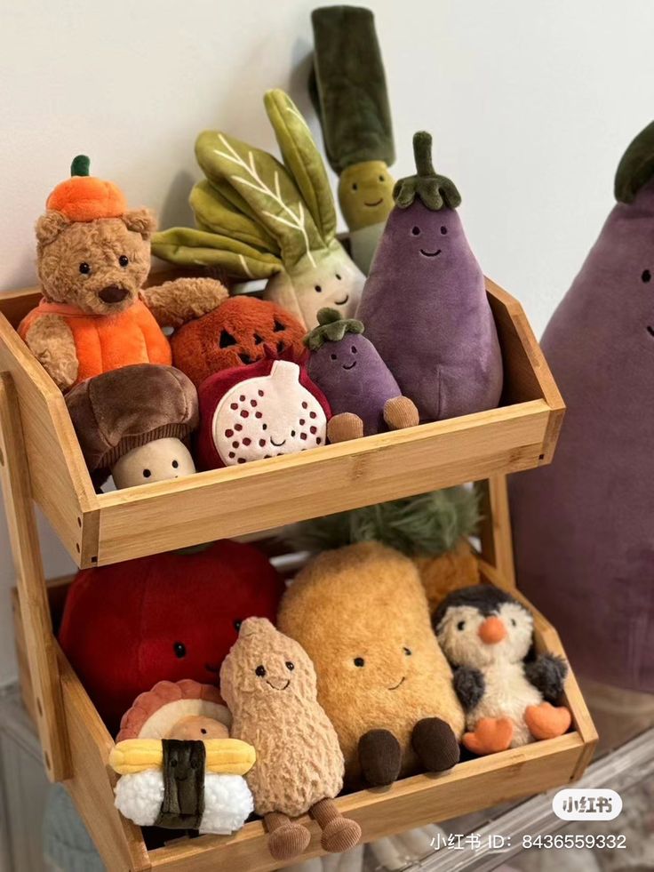 two wooden shelves filled with stuffed animals next to each other