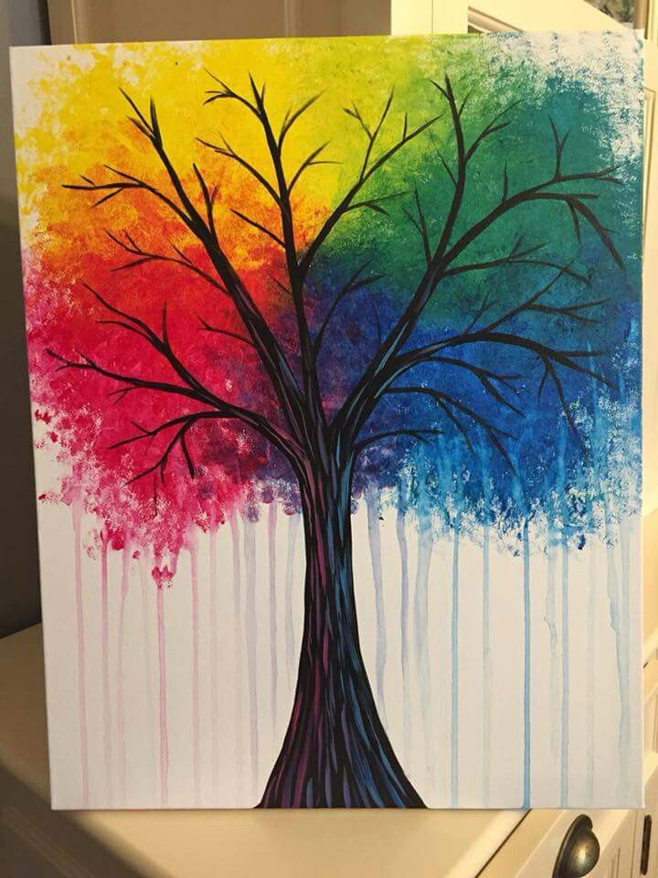 a painting of a tree with rainbow colors on it