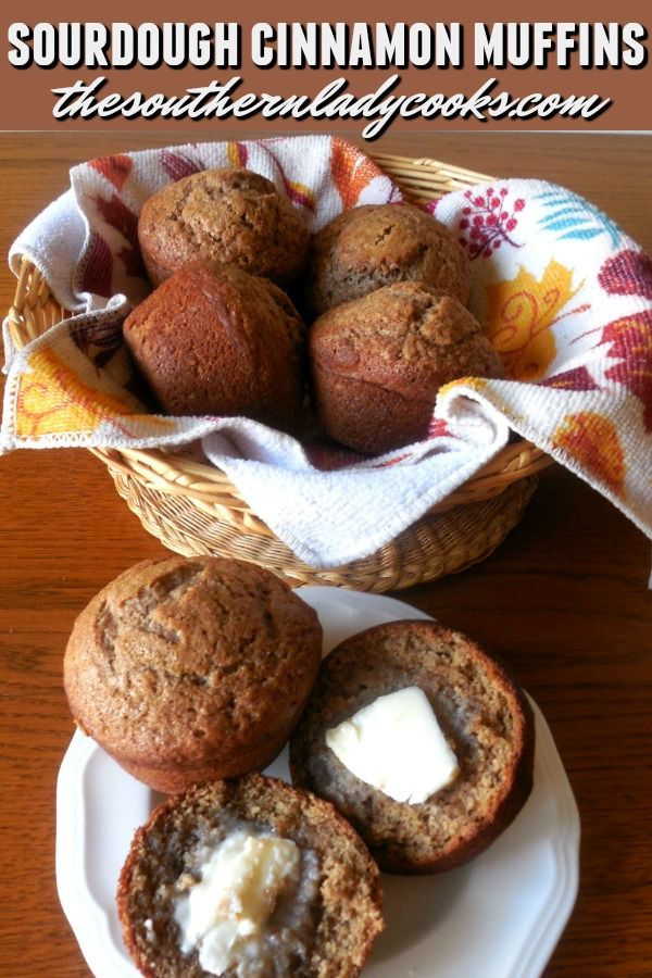 some muffins are on a plate with butter in them and the words sourdough cinnamon muffins