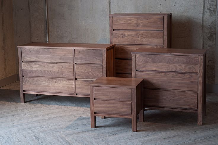 three pieces of furniture are stacked on top of each other in an empty room with wood flooring