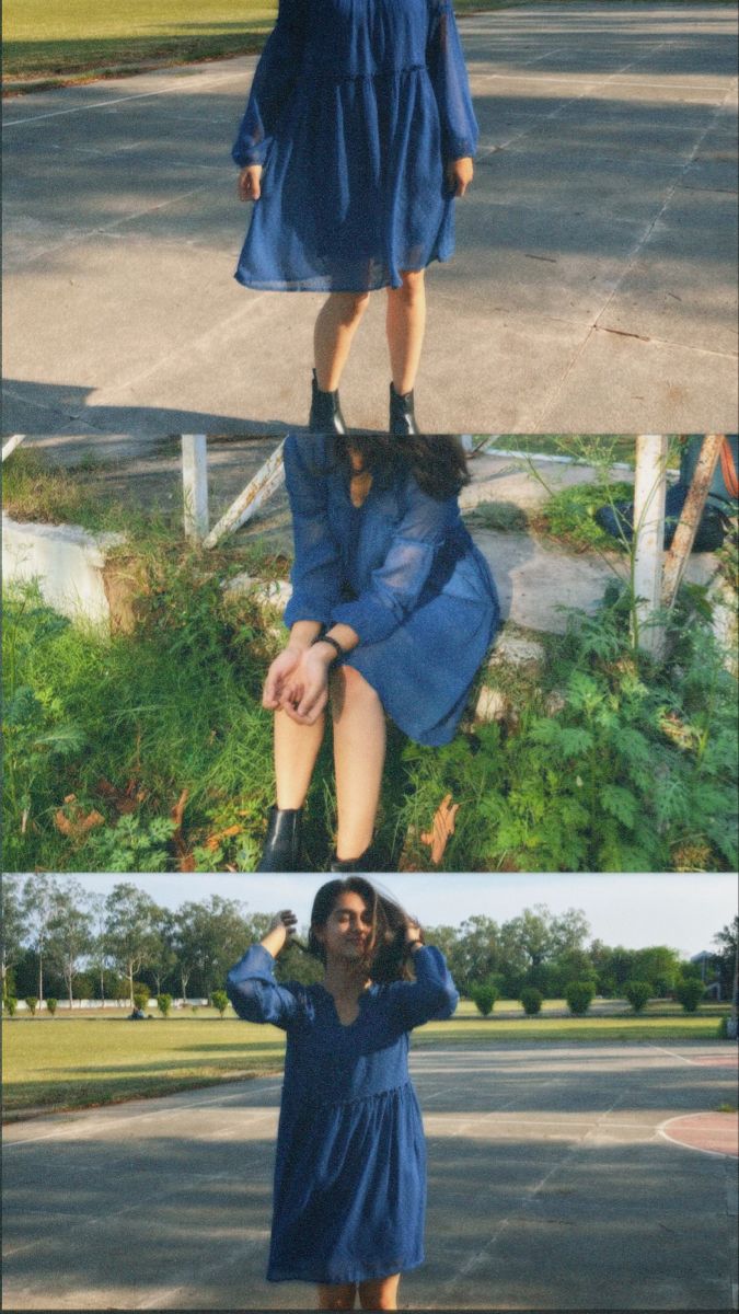 the woman is wearing a blue dress and black boots while standing on her skateboard