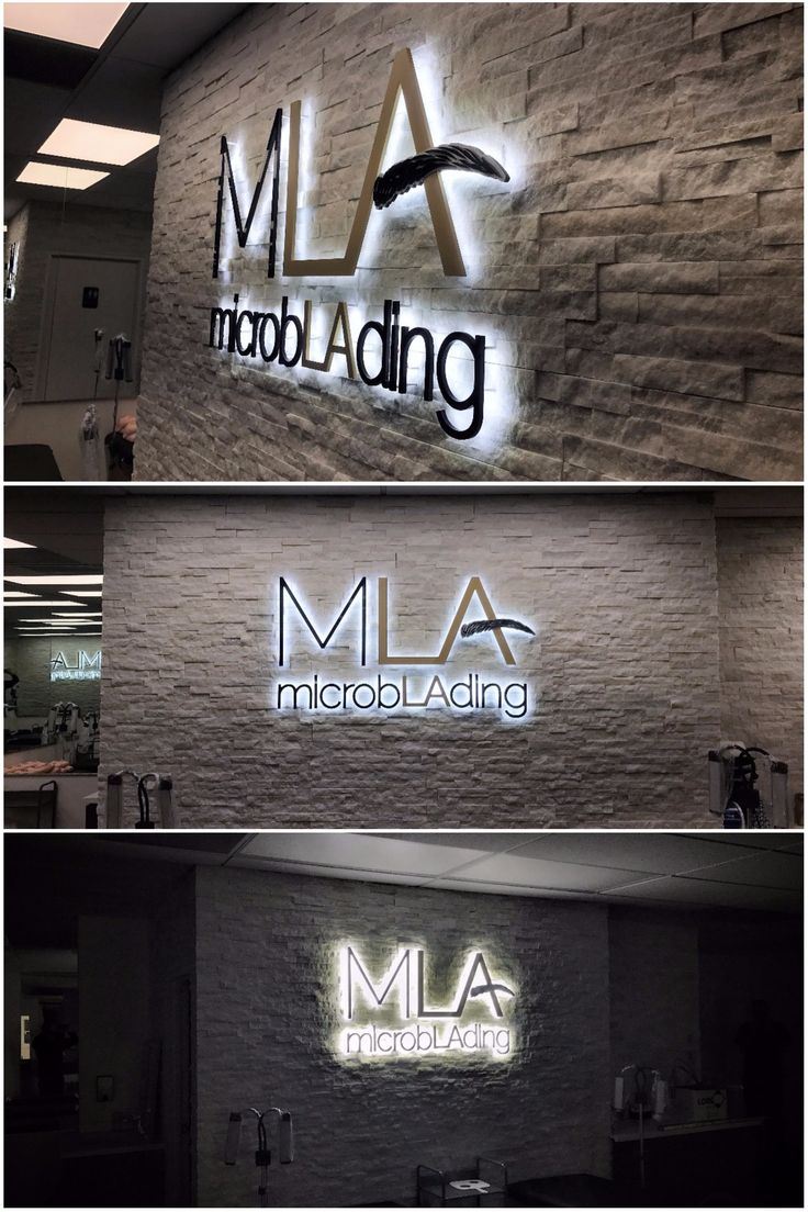 indoor sign that reads "MLA" with "microbLAding" underneath. Light is coming out of the back of the letters and shining onto a stone wall. Company Logo Wall, Outdoor Logo, Architecture Restaurant, Lobby Sign, Bar Restaurant Design, Medical Office Design, Office Signage, 3d Business, Backlit Signs