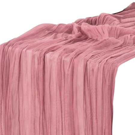 an image of a pink bed spread on top of a white sheeting coverlet