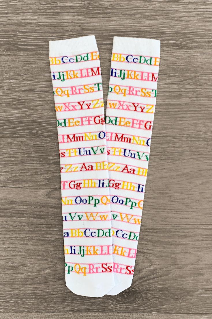 White Alphabet Knee High Socks Accessory Sparkle In Pink Playful Fitted Cotton Socks, Multicolor Stretch Cotton Socks, Non-slip Stretch Cotton Socks, Fun Multicolor Stretch Socks, Cute Stretch White Socks, Cute White Stretch Socks, Fitted Non-slip White Socks, White Fun Non-slip Socks, Fun White Non-slip Socks