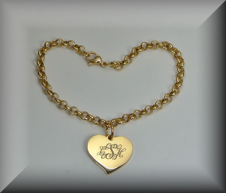 "This personalized gold heart charm bracelet is the perfect engraved gift! These custom engraved charm bracelets make great gifts for bridesmaids or for that special someone. Upon purchase you can send the text you would like engraved along with the font style in a message. If the engraving is too long or needs to be revised in any way, you will be contacted in a reply message with the revision that is required. You can also send a message prior to purchase to discuss the engraving you would lik Elegant Personalized Heart Pendant Bracelet, Classic Heart Bracelet For Valentine's Day Gift, Gold Charm Bracelet With Heart Charm As Gift, Personalized Heart Charm Bracelet For Mother's Day, Gold Charm Bracelet With Heart Charm For Wedding, Gold Charm Bracelet With Heart Pendant For Gift, Personalized Mother's Day Heart Charm Bracelet, Classic Engraved Charm Bracelet As Personalized Gift, Heart-shaped Name Bracelet With Heart Charm For Personalized Gift