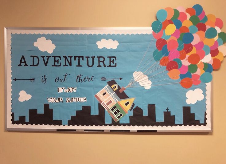 a bulletin board with balloons on it and the words adventure is out there above it