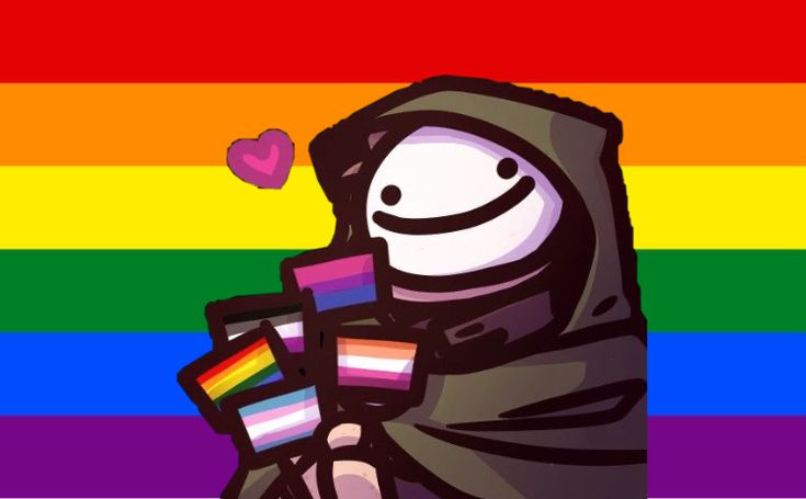 a person in a hooded jacket holding a rainbow card