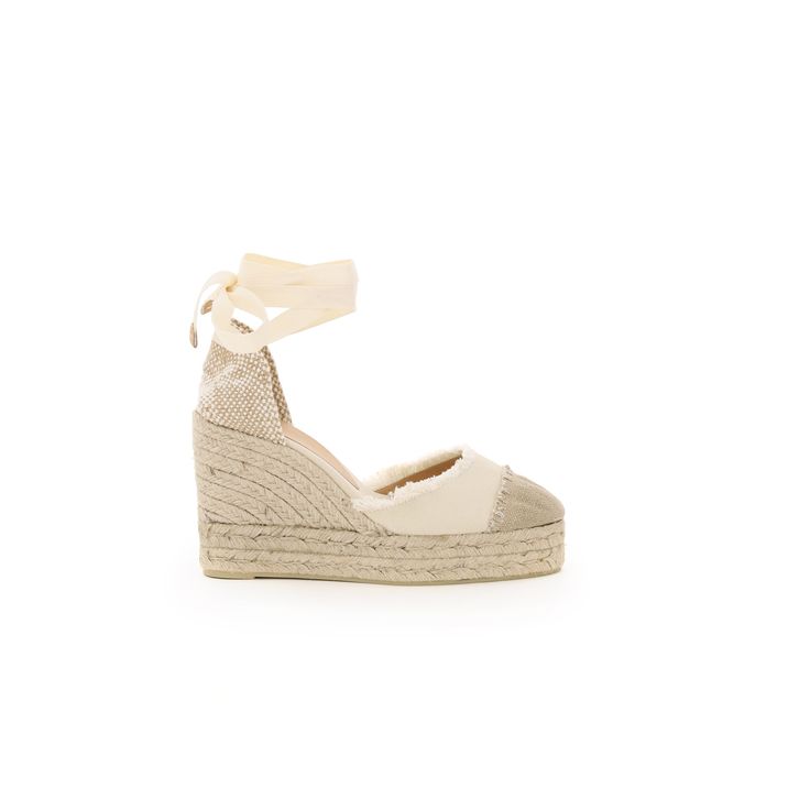 Catalina Handcrafted Espadrilles By Castaner With The Front Upper In Two-Tone Cotton Canvas Enriched By Fringed Profiles. Heel With Ribbon Tied At The Ankle, Wedge Covered In Braided Rope, Canvas Interior, Rubber Sole.Material: 100%CoMade In: SpagnaColor: Mixed ColoursCollection: Spring - Summer 2023Catalina 8ed 001 Beige Straw High Heels, Espadrille High Heels With Wrapped Heel, Elegant Wedge Heel Espadrilles With Woven Sole, Beige Closed Toe Espadrilles With Woven Sole, Chic High Heel Espadrilles With Woven Sole, Cream Round Toe Straw Espadrilles, Cream Straw Espadrilles With Round Toe, Chic Straw Espadrilles With Wrapped Heel, Chic Espadrilles With Woven Sole And Ankle Strap