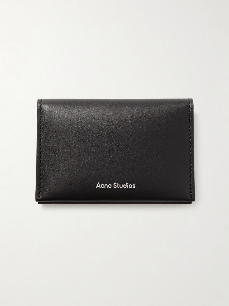 Acne Studios' wallet perfectly captures the label's Scandinavian minimalist vibe. Made from supple leather, it's detailed simply with the logo in silver-tone lettering at the front and opens to reveal two card slots and one billfold compartment for cash. Acne Studios Wallet, Minimalist Vibe, Designer Wallet, Scandinavian Minimalist, Acne Shop, Women Wallet, Bag Essentials, Designer Wallets, Black Wallet