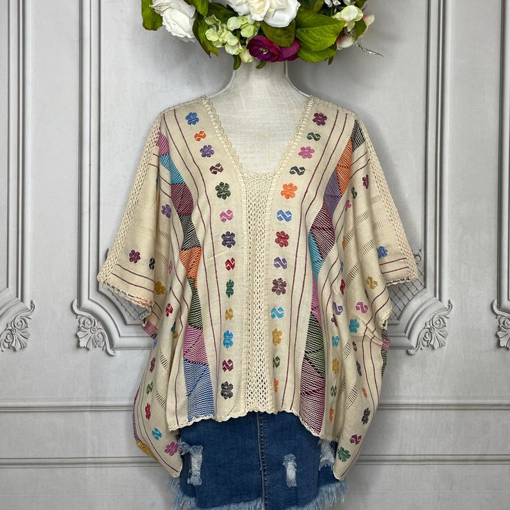 Oaxacan Huipil Blouse - Amuzgo – Camelia Mexican Boutique Bohemian Beige Tops With Natural Dye, Beige Bohemian Tops With Natural Dye, Folk Style Poncho With Floral Embroidery, Traditional Summer Poncho For Festivals, Bohemian Tops With Woven Motifs For Spring, Bohemian Multicolor Floral Embroidered Poncho, Traditional Multicolor Floral Embroidered Poncho, Bohemian Embroidered Summer Poncho, Traditional Multicolor Poncho With Floral Embroidery