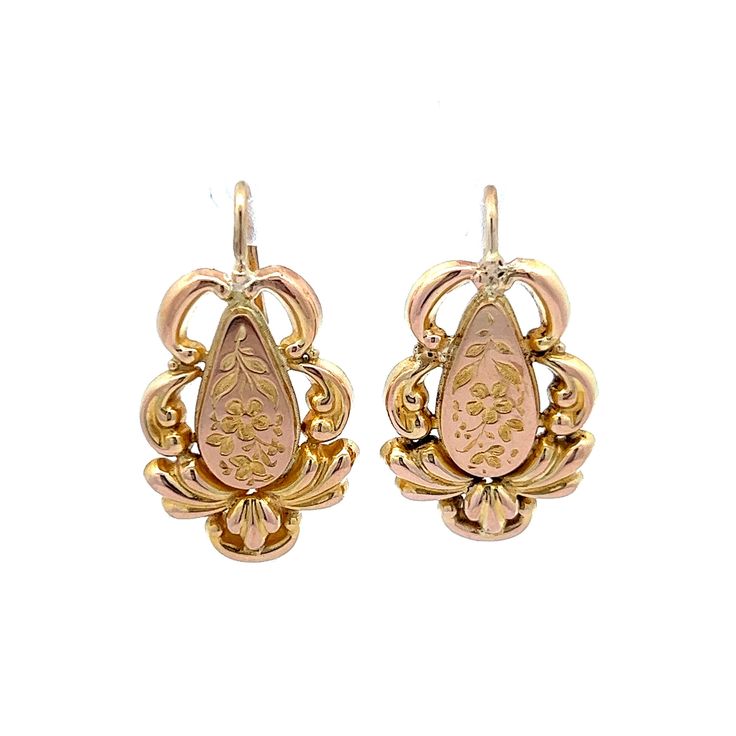 Antique Victorian Floral Earrings in 14k Yellow Gold These antique Victorian drop earrings are a timeless treasure! Crafted from 14 karat yellow gold, these pieces feature beautiful filigree motifs and floral engravings. The earrings measure two inches long and feature a polished yellow gold finish. The intricate filigree motifs are accented with floral engravings for a unique look. The classic drop earrings are perfect for adding a touch of antique elegance to any outfit. These earrings are gre Victorian Yellow Gold Drop Earrings, Antique Yellow Gold Drop Earrings, Antique Yellow Gold Earrings For Formal Events, Antique Yellow Gold Earrings For Formal Occasions, Antique Yellow Gold Earrings For Wedding, Antique Yellow Gold Wedding Earrings, Victorian Filigree Oval Earrings, Victorian Oval Filigree Earrings, Victorian Oval Pierced Earrings