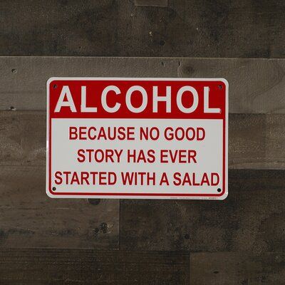 a red and white sign that says alcohol because no good story has ever started with a salad