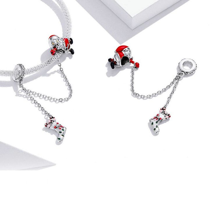 This is charm only, bracelet is sold separately. This cute Santa Claus Christmas safety chain for Pandora style bracelet is made of solid 925 sterling silver with enamel color decoration features cute Santa Claus holding a gift sock with chain. Add this cute Santa Claus Christmas security chain to your existing Pandora style bracelet or as gift for your love one this holiday season. Jewelry Care: See more information about how to care for your jewelry here. Shipping Policy: Orders will be shippe Christmas Festive Silver Charm Bracelet, Christmas Silver Charm Bracelet Gift, Silver Christmas Charm Bracelet Gift, Silver Charm Bracelet For Christmas Gift, Silver Charm Bracelets For Christmas, Pandora Style, Santa Claus Christmas, Safety Chain, Sock Gifts