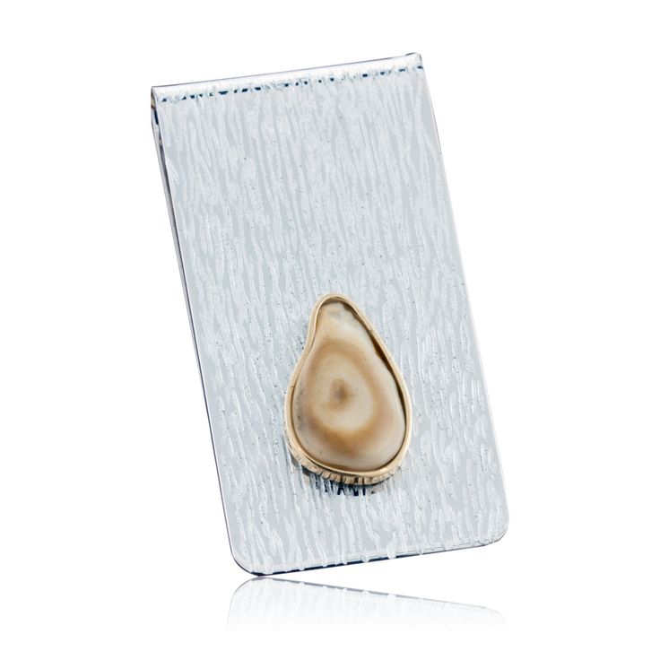 Each individual elk tooth is perfected fitted and securely bezel set in this unique money clip. A great and useful way to display the elk ivory from your trophy elk. Memories of the time that you shared with family and friends while hunting that magnificent elk will flood your mind and lift your heart as you use this cherished ivory tooth money clip. This money clip is sterling silver and 14K yellow gold. Steps to order: Add to Cart. Enter ELK100 in Coupon Code if providing your own ivory for $1 Elk Ivory, Park City, Bezel Setting, Money Clip, Phone Ring, Coupon Code, Elk, Jewelry Inspiration, Hunting