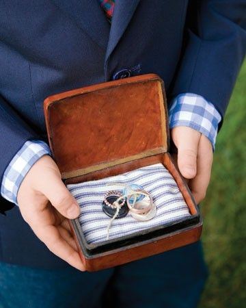 two pictures of the same person holding their wedding rings in an open box and another photo of them