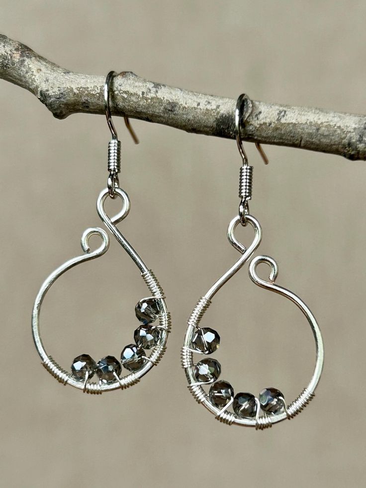 Glass bead earrings - silver *This is the exact pair you will receive Nickel-free Silver Teardrop Wrap Earrings, Nickel Free Silver Teardrop Wrap Earrings, Silver Nickel-free Teardrop Wrap Earrings, Silver Beaded Metal Earrings As Gift, Sterling Silver Wire Wrapped Crystal Earrings, Silver Metal Beaded Earrings For Gift, Sterling Silver Teardrop Earrings With Silver Beads, Silver Drop Earrings With Silver Beads, Nickel-free Metal Beaded Earrings