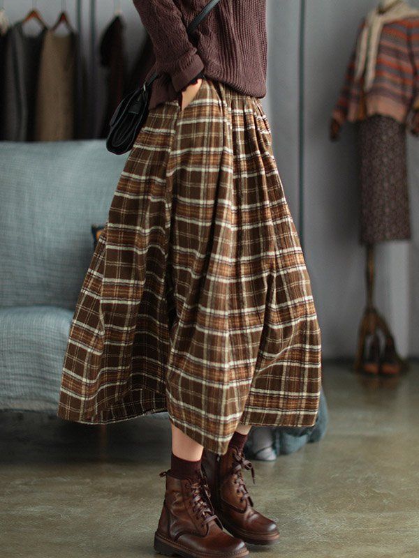 Casual A-line Bottoms For Fall, Casual A-line Winter Skirt, Casual Brown A-line Skirt, Non-stretch A-line Fall Skirt, Retro A-line Winter Skirt, Non-stretch Brown Skirt With Pockets, Non-stretch Brown Cotton Skirt, Brown A-line Skirt For Spring, Spring Brown A-line Skirt