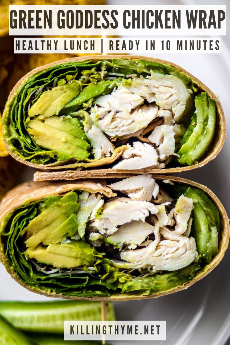 two wraps filled with chicken and lettuce sitting on top of a white plate