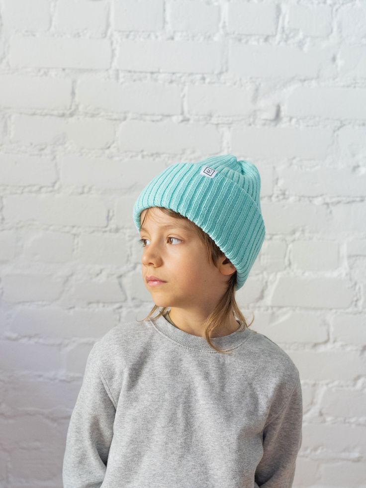 To choose a toque of another color, it is here: https://www.etsy.com/ca-fr/shop/desEnfantillages?section_id=24967204 -- The ribbed knit tuque - ideal for keeping warm and adding a little style, colour and warmth to the cold days of November or February. Our hats are carefully knitted by our team members. They are offered in urban style with a wide ribbed ledge, in 4 sizes. They are also available in the small-rimmed ribbed fisherman's style, designed to be worn on or just above the ears in a sin Blue Fitted Casual Beanie, Playful Blue Winter Beanie, Winter Cotton Bonnet Hat, Winter Cotton Bonnet, Slouchy Cotton Beanie For Winter, Blue Winter Beanie, Blue Winter Beanie Cap, Blue Winter Beanie For Outdoor Use, Trendy Blue Beanie One Size