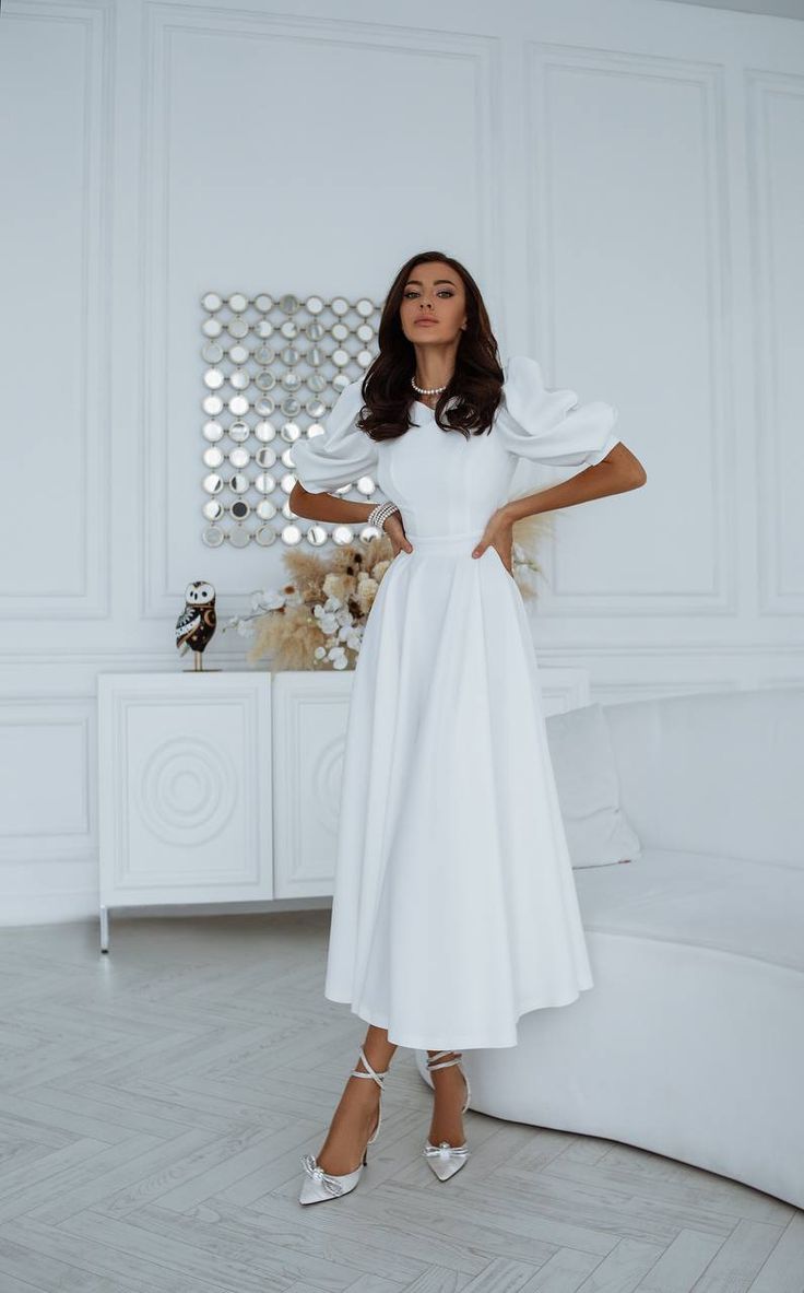 Fabric: Crepe Viscose 50%, Polyester 40%, Elastane 10% Round neckline Puff sleeves Short sleeves Backless dress Midi length Colors: White Confirmation Dresses, White Wardrobe, Chic And Elegant, White Midi, Puff Sleeve Dresses, Red Sky, Reception Dress, Dress Midi, Midi Length Dress