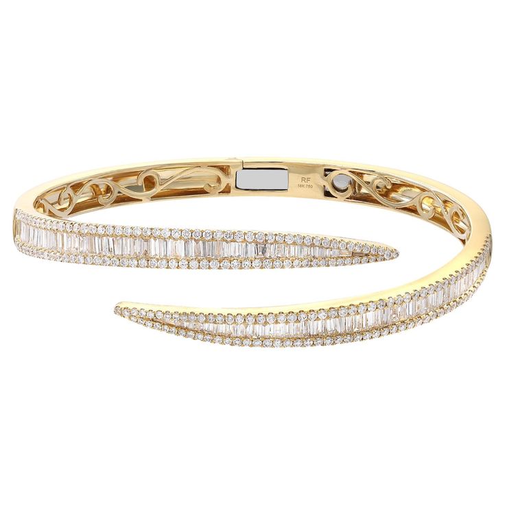 A classic look with easy elegance, this diamond bangle bracelet exudes sophistication. This stunning bracelet is crafted in 18k yellow gold and features channel set baguette cut and round cut diamonds with a total diamond weight of 3.76 carats. Diamond color G-H and VS-SI clarity. It's stackable and easy to wear. Bangle width: 6.2mm. Weight: 25.48 grams. Wrist fit: 6.5 inches. Comes with a presentable gift box and appraisal. Pave Diamond Wedding Bands, Diamond Bangle Bracelet, Bangles Making, Simple Diamonds, Diamond Bangles Bracelet, Bangles Style, Baguette Cut Diamond, Fine Jewelry Bracelets, Diamond Bangle