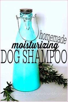 a blue glass bottle sitting on top of a white surface with the words homemade moisturizing dog shampoo