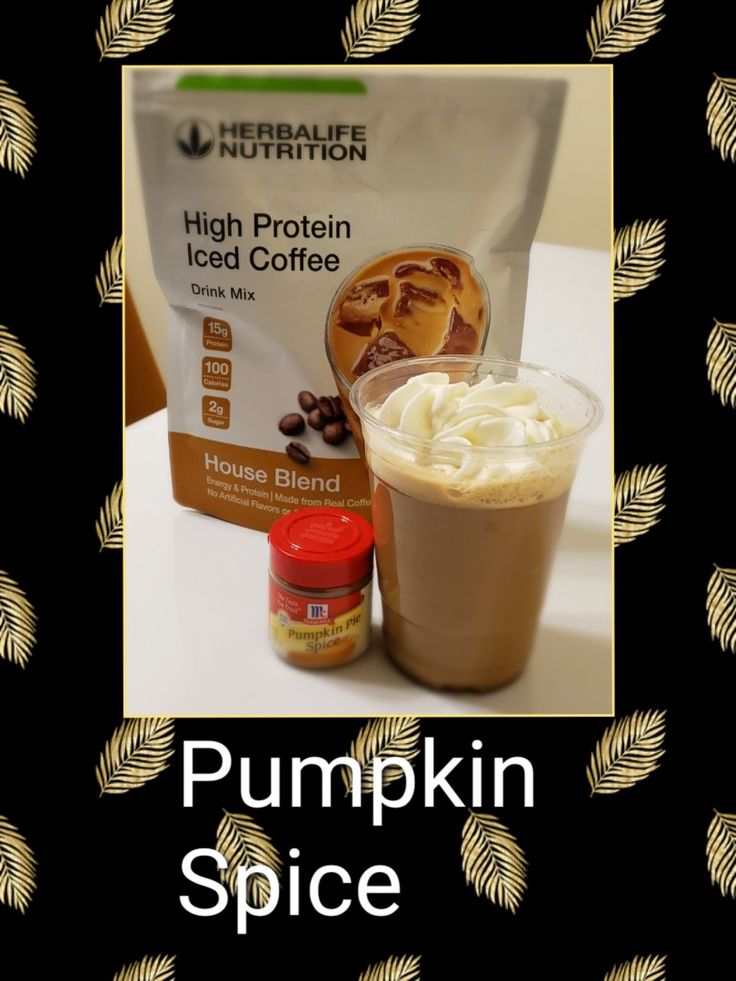 pumpkin spice coffee drink mix in a cup with whipped cream and cinnamon on the side