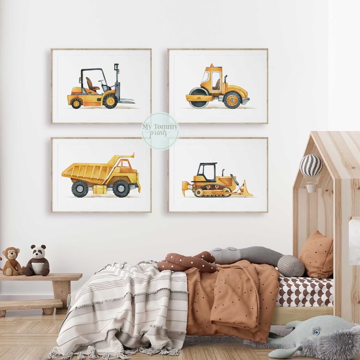 a child's bedroom with construction vehicles on the wall