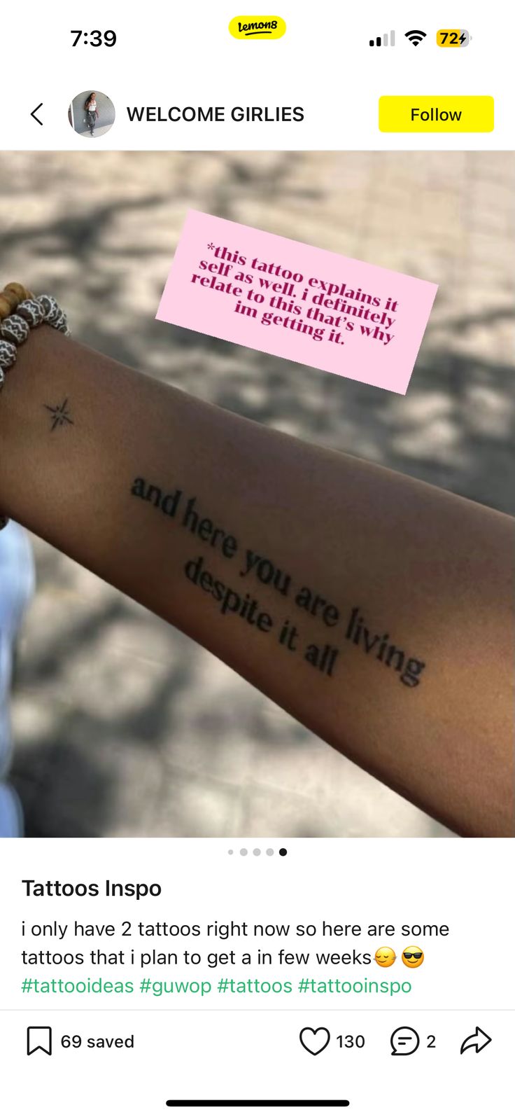 a person with a tattoo on their arm that says, and here you are living despite it all