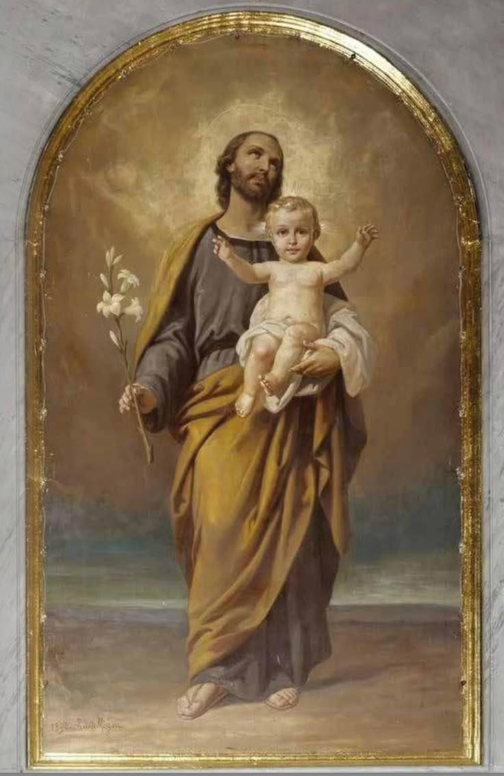 a painting of jesus holding a child in front of a gold framed wall hanging on the side of a building