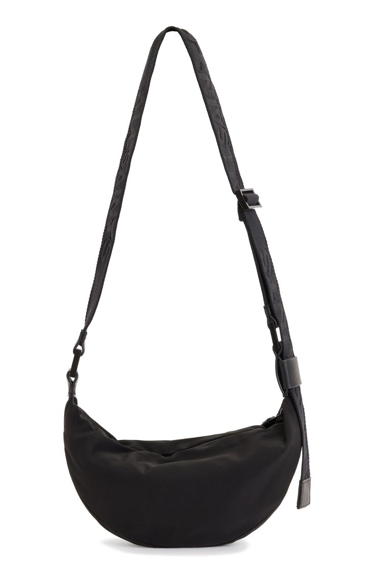 A half-moon silhouette lends visual intrigue to a spacious crossbody bag fashioned with a constrasting, adjustable strap. Cotton lining Textile with leather trim Imported Moon Silhouette, Nylon Crossbody Bag, Half Moon, Leather Trim, Leather Trims, Adjustable Straps, Crossbody Bag, Nordstrom, Moon