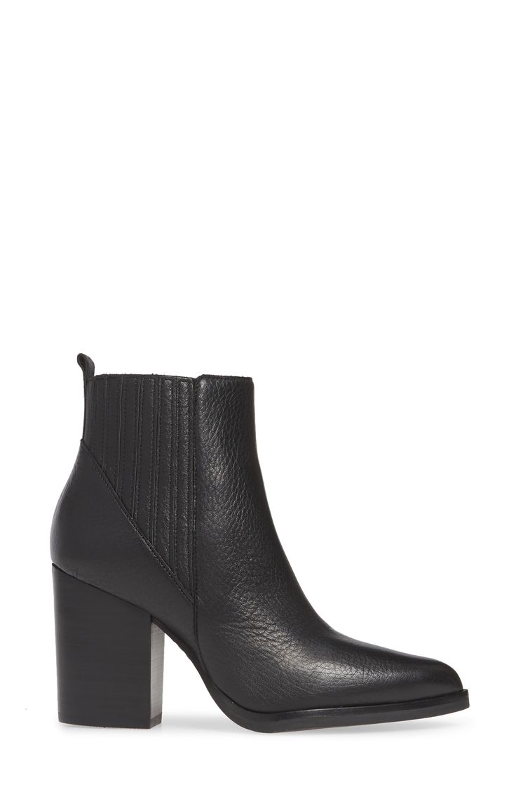 A bold block heel grounds this ankle boot in contemporary-chic sophistication. 3 1/4" heel (size 8.5) 4" shaft Pull-on style with covered elastic-gore insets Leather or genuine calf hair (origin: USA) upper/synthetic lining and sole Imported Women's Shoes Contemporary Chic, Marc Fisher, Calf Hair, Women Style, Bootie, Women's Shoes, Block Heels, Ankle Boot, Leather Upper