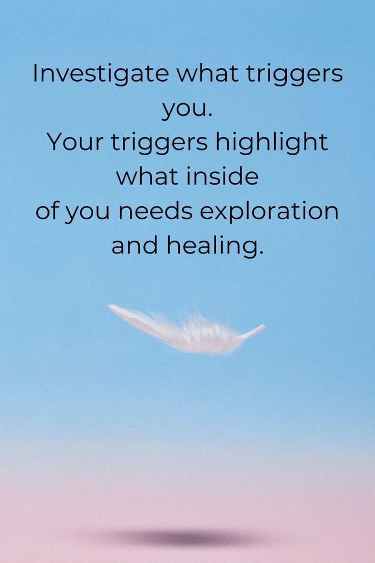 a white feather flying through the air with a blue sky in the background that says investigate what triggerers you, your triggers highlight what inside of you needs explanation and heal