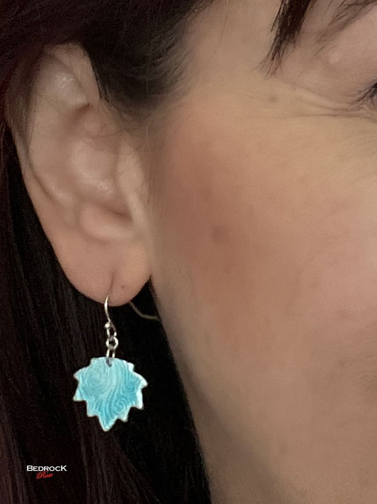 Get ready to swirl and twirl with these powder blue earrings! Made of silver and featuring a glass design, these beauties add a touch of fun and whimsy to any outfit. Blue Sterling Silver Flower Earrings Nickel Free, Blue Teardrop Nickel Free Flower Earrings, Blue Teardrop Flower Earrings Nickel Free, Light Blue Drop Earrings For Gift, Unique Blue Hypoallergenic Jewelry, Blue Flower Earrings For Gift, Handmade Swirl Earrings As Gift, Blue Hypoallergenic Flower Earrings As Gift, Blue Whimsical Earrings For Gifts