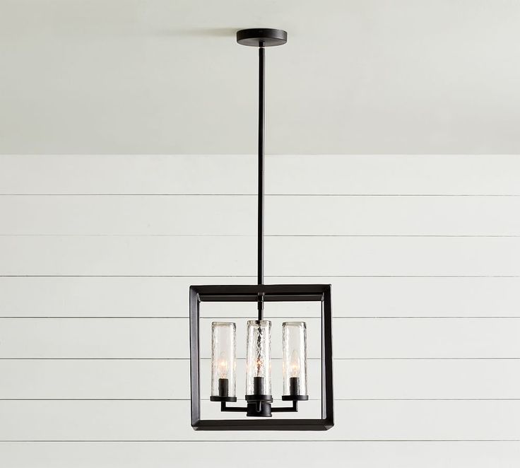 a square light fixture hanging from the ceiling