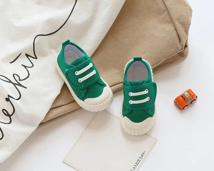 Vibrant Kids Canvas Shoes - Momorii Playful Green Sneakers With Rubber Sole, Cute Cotton Sneakers With Round Toe, Cute Green Sneakers For Spring, Green Cotton Sneakers For Spring, Trendy Green Canvas Shoes With Rubber Sole, Green Canvas Shoes With Round Toe For Summer, Green Round Toe Canvas Shoes For Summer, Trendy Green Low-top Canvas Shoes, Non-slip Low-top Canvas Shoes For Summer