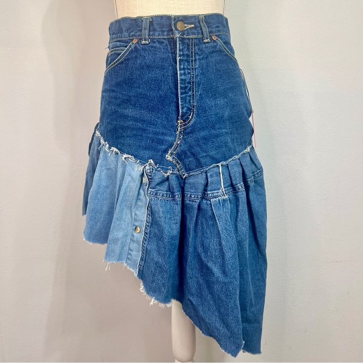 Nwt Urban Renewal By Urban Outfitters Re/Creative Remade Asymmetrical Denim Ruffle Skirt Open To Offers! Enjoy This Asymmetrical Denim Ruffle Skirt, Created From Unique Vintage And Deadstock Items From Around The World. This Is A 1/1 Piece As No Two Are Exactly Alike! Pair This With A Crop Top Or A Graphic Tee For The Perfect Fit!! Check My Store For Any Outfit Additions With Free Shipping On Bundles!! Nwt And Sold Out On The Urban Outfitters Website! Size: Small; Refer To Measurements Below Wai Denim Bottoms With Medium Wash And Asymmetrical Hem, Asymmetrical Hem Denim Skirt In Medium Wash, Asymmetrical Medium Wash Denim Skirt, Denim Blue Asymmetrical Hem Skirt, Reworked Denim Skirt For Summer, Asymmetrical Denim Blue Denim Bottoms, Dark Wash Bottoms With Asymmetrical Hem For Summer, Casual Reworked Denim Skirt, Spring Medium Wash Denim Skirt With Asymmetrical Hem