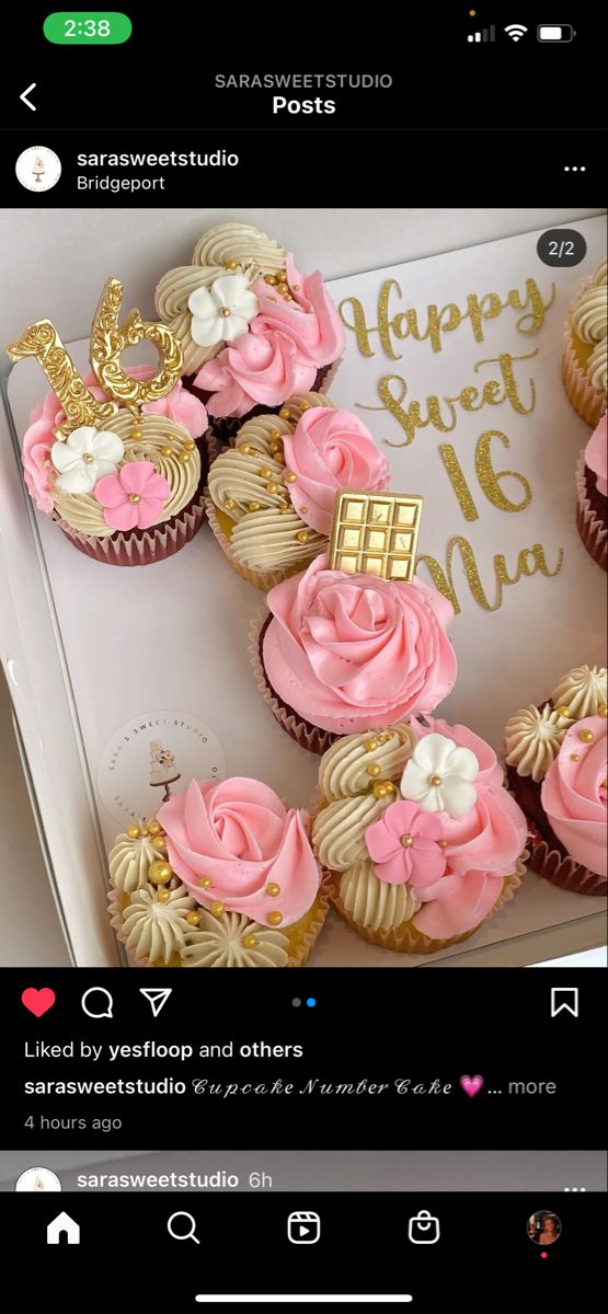 cupcakes decorated with pink frosting and gold decorations