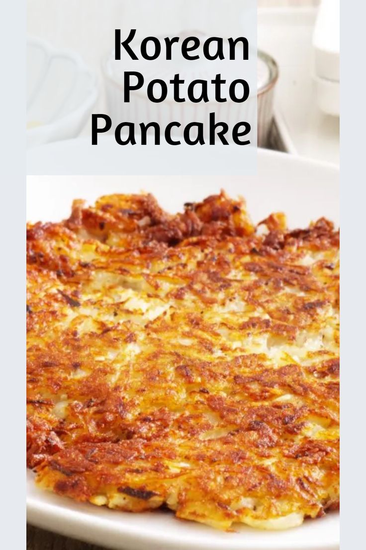 korean potato pancake on a white plate with text overlay reading korean potato pancake