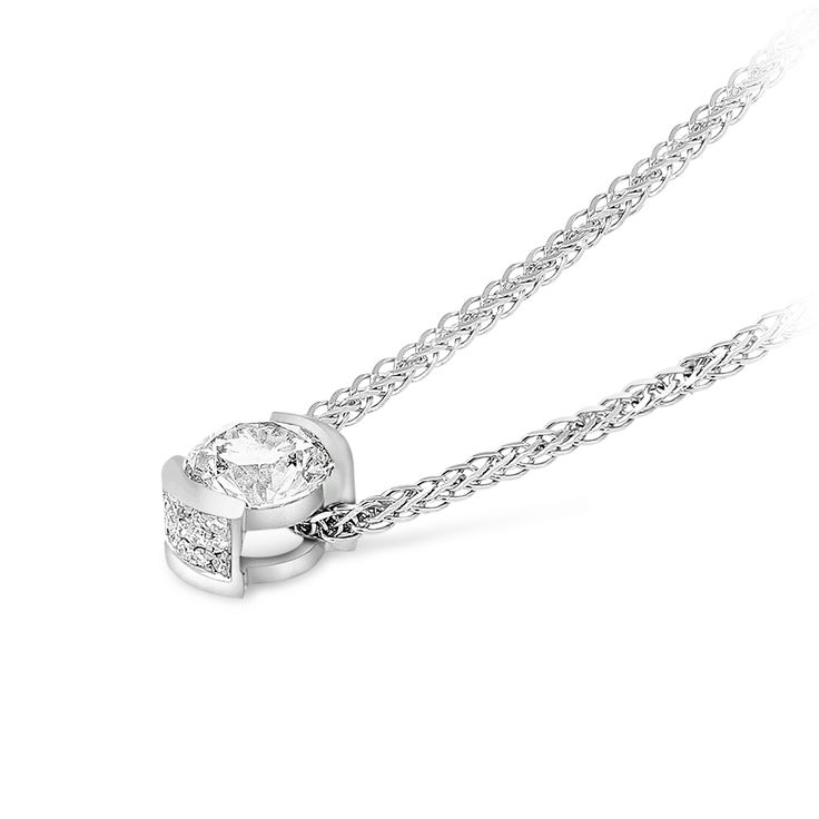 Modern and sophisticated, this necklace is a captivating look any woman would adore. Beautifully crafted, this ring features a dazzling 0.77 carat center stone placed prominently in an 18K white gold half-bezel setting that enhances the diamond's size and sparkle.  This classic look is one she'll turn to often, everyday and on special occasions. An amazing and thoughtful anniversary gift for your loved one.
0.77 Classic diamond pendant set in 18K white gold
Center Diamond:&nb Diamond Pendant Set, Half Bezel Setting, Half Bezel, Diamond Pendant Sets, Gold Link Chain, Pave Pendant, Gold Link, Diamond Star, Ball Pendant