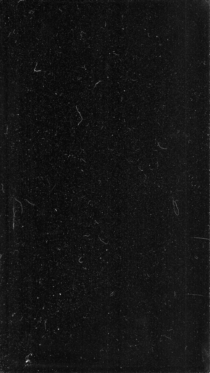 an old black and white photo with small dots on it's edges, in the dark