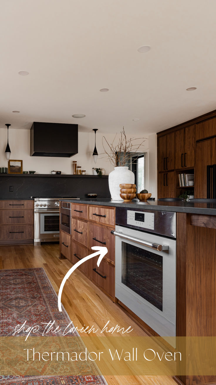 an image of a kitchen setting with wood flooring and white appliances in the background