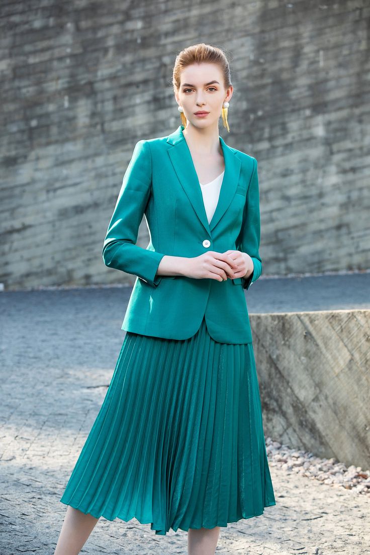 Red V-Neck Fishtail Skirt Suit V neckline Blazer Long sleeves Structured shoulders. Skirt - Hem hits below the knee. Pleated Back zip. Polyester 10% / Viscose 90% Imported Dry clean Item No.: 201026C1+S4 Green Pleated Skirt, Suits Wedding, Fishtail Skirt, Skirt Suit Set, Work Suits, Velvet Pants, Knee Length Skirt, Skirt Suit, Teal Green