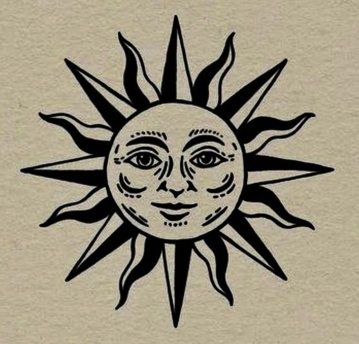 the sun with its face drawn in black ink