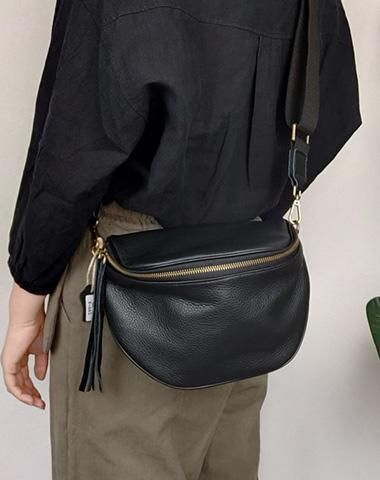 Overview:Design: Crossbody Black Leather Bag Womens Black Cross The Body Bag Black Leather Bag CrossbodyIn Stock: Made to order (2-3 days)Include: A Shoulder BagCustom: NoColor: BlackLeather: CowhideMeasures: 22cm x 17cm x 9cmWeight: 0.55 kgSlots: 1 slotAccessories(option): NoStyle: Crossbody Black Leather Bag Womens Black Cross The Body Bag Black Leather Bag CrossbodyVery durable (At least 5 Years) and it should last a life time Description: The Badass Black Leather Saddle Bag Shoulder Bag Chest Bag for women is a stylish and versatile accessory designed to meet the needs of modern women on the go. Made from high-quality leather, this bag combines elegance with functionality, making it an ideal companion for travel, daily errands, or any adventure. The bag measures 23cm in length, 18cm in Black Leather Sling Bag, Outfit With Crossbody Bag, Small Bag Ideas, Women’s Purses, Small Purse Outfit, Leather Sling Bags Women, Crossbody Bag Outfit, Cross Shoulder Bag, Side Bags For Women